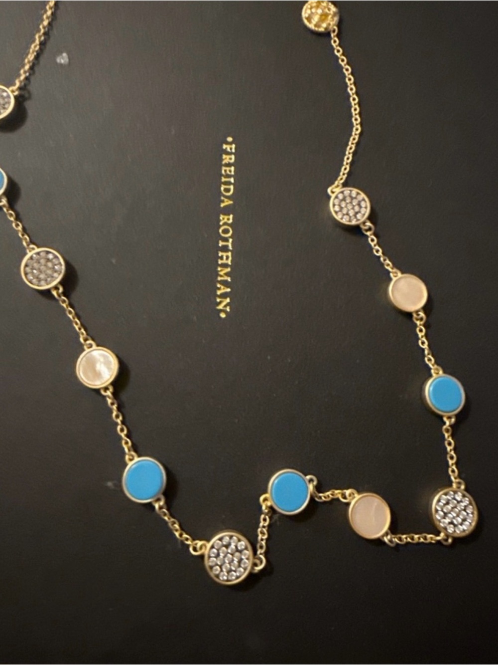 Freida Rothman Gold Station Necklace with Blue and Cream Accents